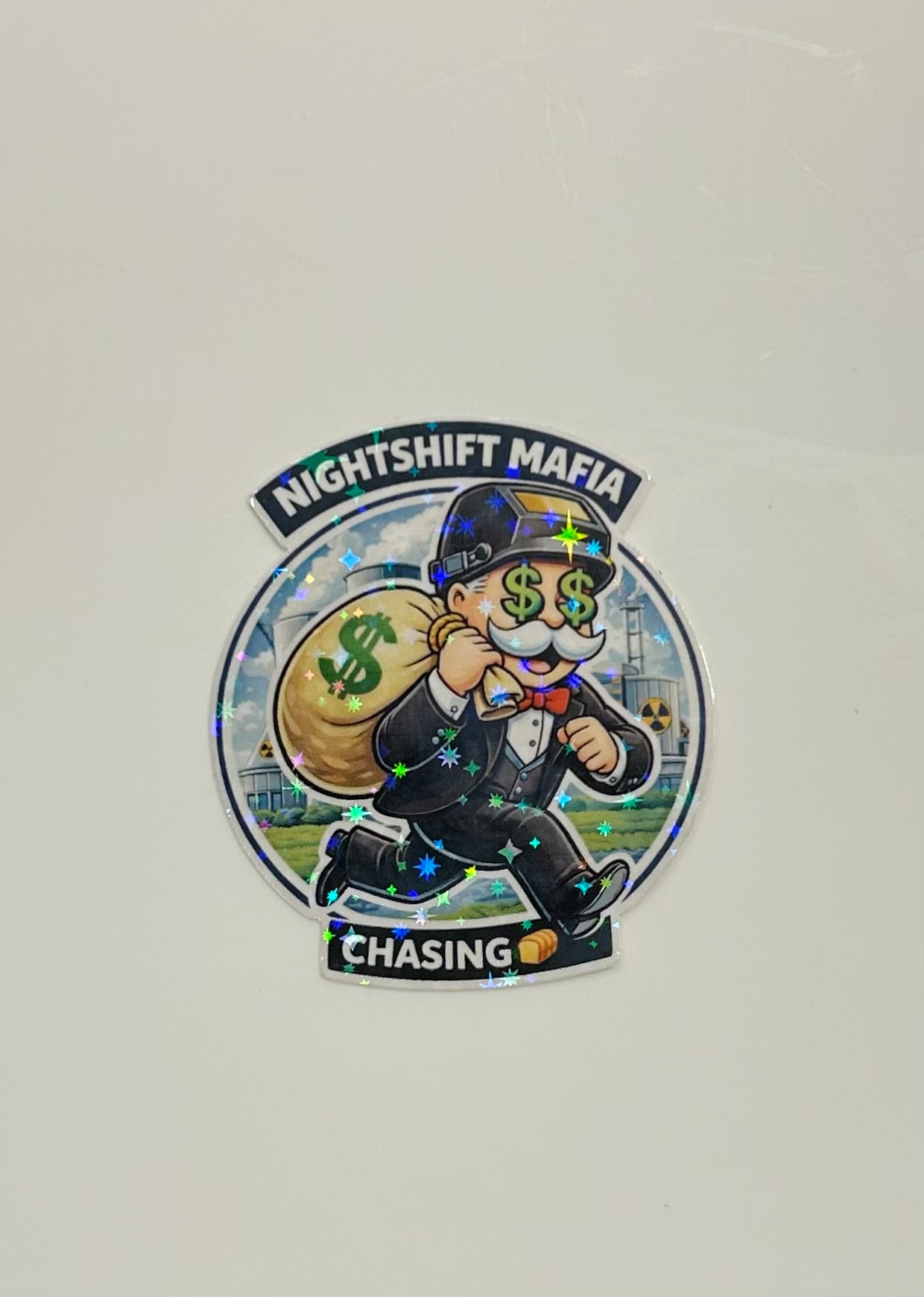 “Chasing 💰” Holographic Sticker Main image